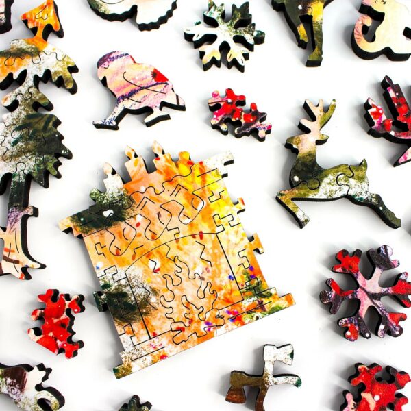 happy winter wooden jigsaw puzzle showing whimsy pieces shaped like a fireplace with christmas stockings and a reindeer